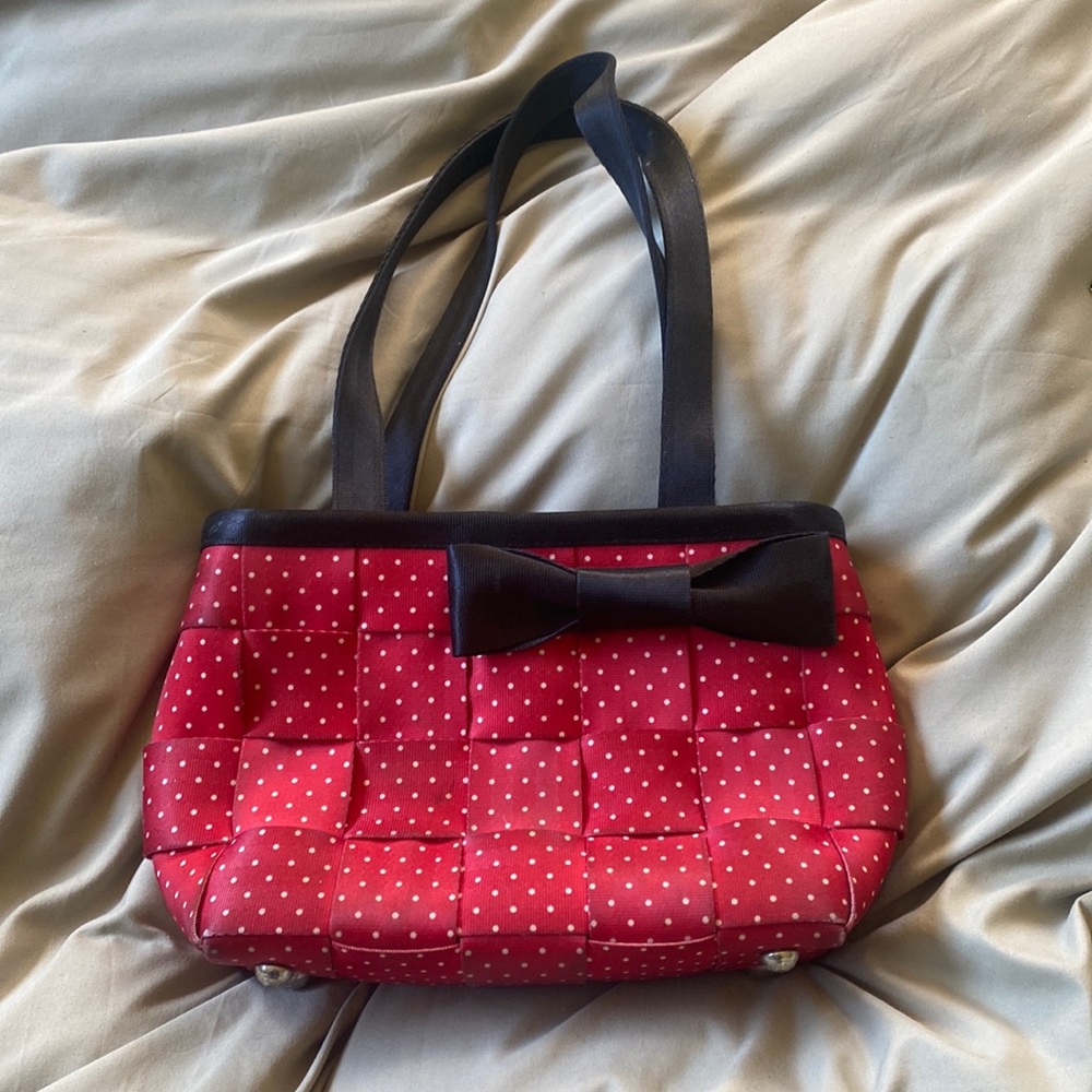 Limited edition Harvey’s for Disney Couture purse. Great condition!